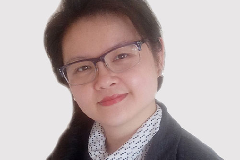 Headshot of Dr Xin-Yi Chua
